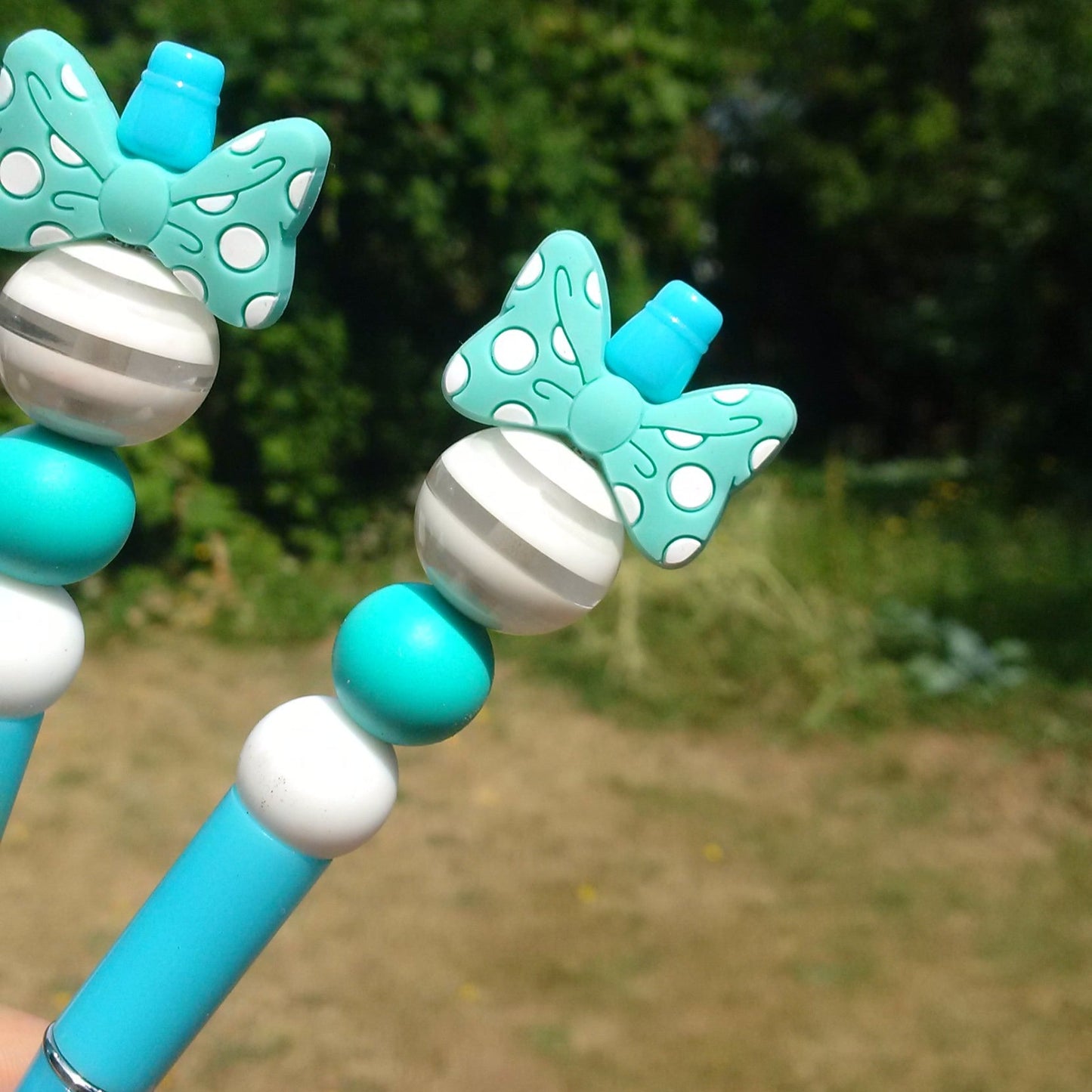 Tazzling Teal Bowtie Beaded Pen