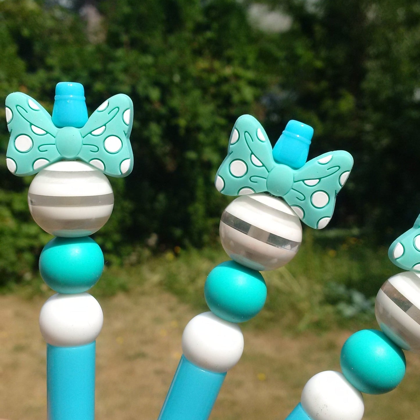 Tazzling Teal Bowtie Beaded Pen
